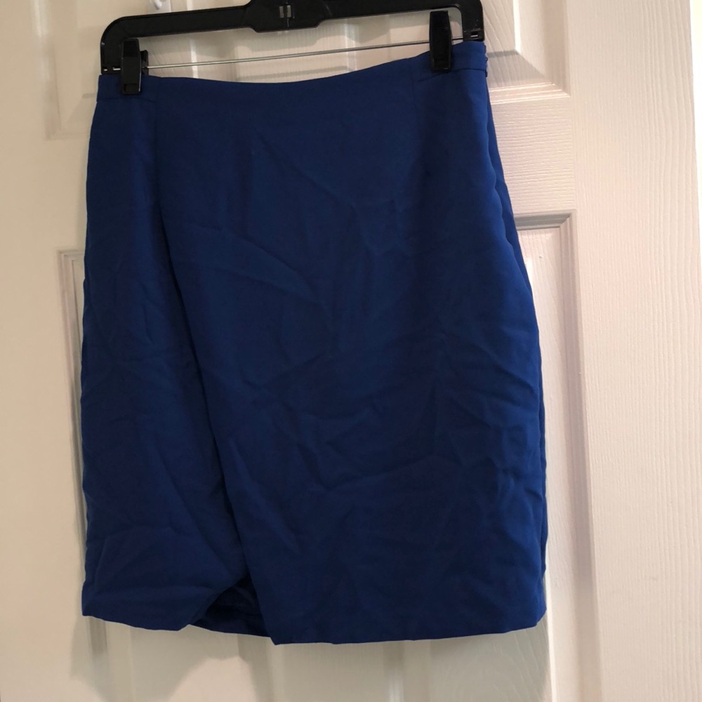 Front slit skirt. Will iron.